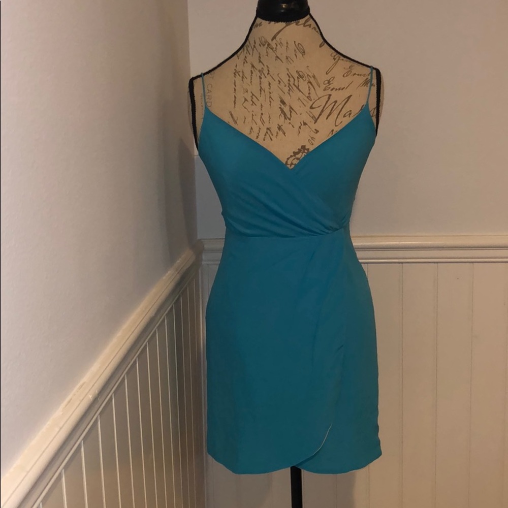 Teal spaghetti strap dress.